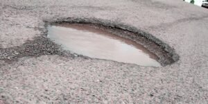 Dangerous pothole in Walmart parking lot caused a serious injury from a slip, trip and fall accident in Toronto